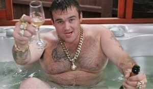 man in tub drinking after winning jackpot