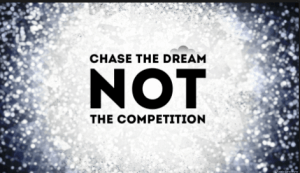 The picture shows a text that reads, chase the dream not the competion